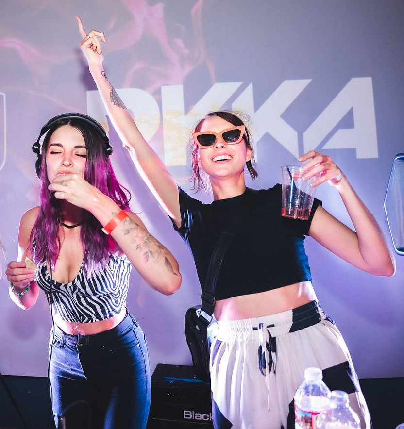 Photograph of Pyka and Magda DJing at a show